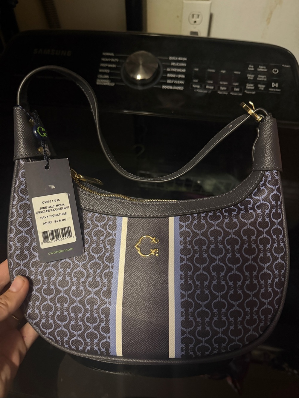 C. Wonder Navy and Light Blue Crescent Shoulder Bag with Gold Logo